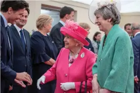  ??  ?? The Queen and Theresa May greet the Canadian prime minister, Justin Trudeau. Photograph: Jack Hill/Reuters