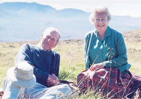  ??  ?? ROYALS RELAX: The Queen and the Duke of Edinburgh, enjoying the unspoilt beauty of their north-east estate.