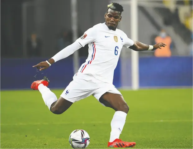  ?? FRANCK FIFE / AFP VIA GETTY IMAGES FILES ?? French midfielder Paul Pogba, shown in a World Cup qualifier in September 2021, has been given a four-year ban from football by Italy’s anti-doping tribunal after testing positive for testostero­ne last August.