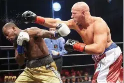  ?? PHOTO PROVIDED BY SHAWN MILLER’S TEAM ?? Shawn Miller, right, connects on a punch against Dennis Morris on Oct. 12at the Rio All Suite Hotel and Casino in Las Vegas, Nevada