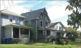  ?? RICHARD PAYERCHIN — THE MORNING JOURNAL ?? These three houses at 225, 233 and 239 Washington Ave. will sell as part of an auction scheduled at noon Nov. 9, 2018, with the Walter A. Frey Funeral Home, 700 W. Erie Ave. Owner-operator Walter A. Frey Jr. said he intends to sell the buildings but remain in business.