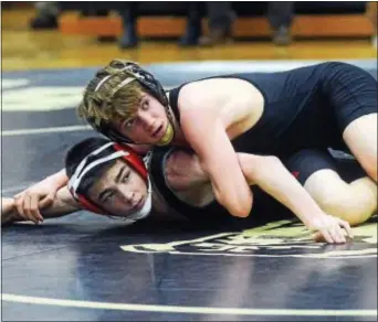  ?? GREGG SLABODA — TRENTONIAN PHOTO ?? Chris Lanciano, top, and the Hopewell Valley wrestling team have a 23-match CVC winning streak.