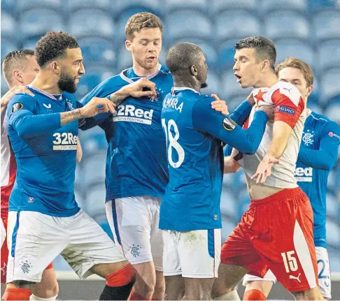  ??  ?? FLASHPOINT: Glen Kamara confronts Ondrej Kudela in their Europa League clash at Ibrox last month.