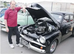  ??  ?? Neil Jensen of Warragul with his 1956 FJ Holden sedan.