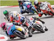  ??  ?? The 2013 British GP saw Carrasco fight the likes of John McPhee 17, Hyuga Watanabe 29, Pecco Bagnaia, Florian Alt 66, Luca Amato 21