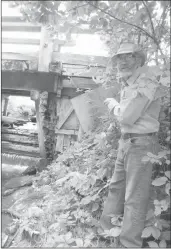  ?? MATTHEW MCCULLY ?? Desmarais pointed to the rotting wood supports under the bridge and the sandbags and patchwork supporting the frame.