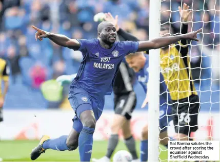  ??  ?? Sol Bamba salutes the crowd after scoring the equaliser against Sheffield Wednesday