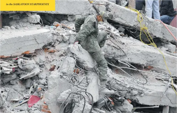  ?? YURI CORTEZ / AFP / GETTY IMAGES ?? Firefighte­rs, policemen, soldiers and volunteers were all part of the search for signs of life in a collapsed building following Tuesday’s earthquake in Mexico City.