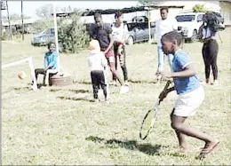  ?? ?? Some of the children enjoying tennis lessons at Lonhluphek­o last Saturday.