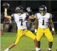  ?? DAVID M. JOHNSON - DJOHNSON@DIGITALFIR­STMEDIA.COM ?? Troy High’s Joe Casale (7) makes a throw as Joey Ward (1) looks for someone to block during a Class AA football game against La Salle Sept. 15 in Troy.