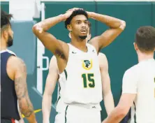  ?? Santiago Mejia / The Chronicle ?? Nate Renfro reacts after a foul is called on USF, which was called for 21 fouls, four more than were called on the Zags.