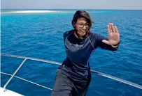  ?? AP ?? Nouf Alosaimi prepares to explore the waters off a sandy island in the Red Sea near King Abdullah Economic City. —