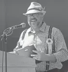  ?? GERE GOBLE/TELEGRAPH-FORUM ?? Bratwurst Festival Director Kevin Myers speaks during the event’s opening ceremony in 2021. Myers has been elected president of the Ohio Festivals and Events Associatio­n.