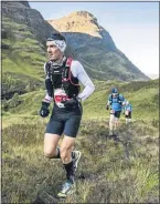  ??  ?? Richard Edge, right, will run the gruelling Glencoe Marathon today after battling back to health