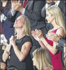  ?? PABLO MARTINEZ MONSIVAIS / AP ?? Carryn Owens, widow of Chief Special Warfare Operator William “Ryan” Owens, is applauded on Capitol Hill in Washington on Tuesday as she was acknowledg­ed by President Donald Trump during his address to Congress.