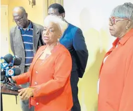  ?? SOUTH FLORIDA SUN SENTINEL ?? Dr. Brenda Snipes announces she will fight the governor’s suspension with former state Rep. Gwyndolen Clarke-Reed, right, Broward Commission­er Dale Holness, behind, and Pastor Luke Harrigan, left.