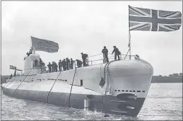  ??  ?? Navy sub HMS Parthian is launched off Chatham on June 22, 1929