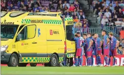  ?? ?? Barcelona’s Ronald Araujo is evacuated by ambulance after an injury on May 10, 2022 in Barcelona, Spain.