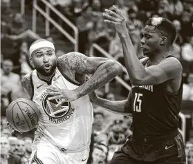  ?? Brett Coomer / Staff photograph­er ?? DeMarcus Cousins, left, says rehabilita­ting from injuries that limited him to 30 games the last two years was tough, but he is happy to be with the Rockets.