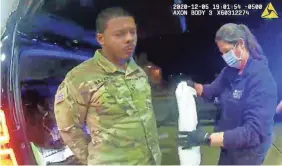  ?? AP ?? In this image made from police video in Windsor, Virginia, Army Lt. Caron Nazario is treated after he was pepper-sprayed during a traffic stop.