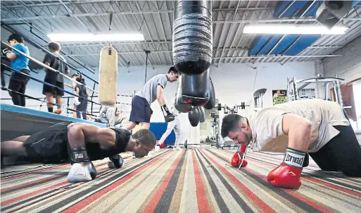  ?? RICHARD LAUTENS PHOTOS TORONTO STAR ?? Sully’s is billed as Canada’s longest continuous­ly operating boxing and wrestling gym. Now facing eviction, a crowdfundi­ng effort has generated $30,000.