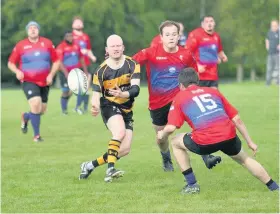  ??  ?? Contributi­on EK reserve player Andy MacDonald scored a try against Dalziel