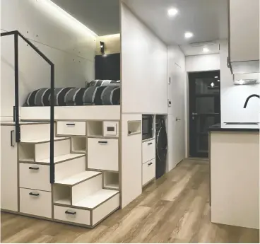  ?? ?? “We tried to think of everything from durability to ease of use and ease of installati­on for every end-user,” says Keith Gowans of Aloft Housing. Compact housing units feature a full kitchen, a washer/dryer combo, heated floors throughout and a loft bed.
