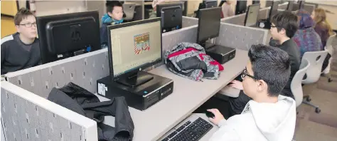  ?? TROY FLEECE ?? Kayin Patel, a Grade 8 student at Jack MacKenzie, learns game design and programmin­g at Campus Regina Public..