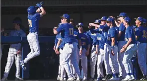  ?? (Arkansas Democrat-Gazette/Staci Vandagriff) ?? Valley View’s Owen Roach (left) celebrates with teammates after his home run against Little Rock Christian on Friday.