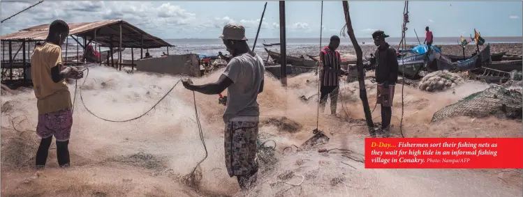  ?? Photo: Nampa/AFP ?? D-Day… Fishermen sort their fishing nets as they wait for high tide in an informal fishing village in Conakry.