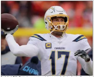  ?? (AP file photo) ?? Quarterbac­k Philip Rivers, shown warming up before a game for the Los Angeles Chargers last season, has agreed to a one-year deal with the Indianapol­is Colts.