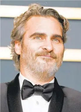  ?? RACHEL LUNA/GETTY 2020 ?? Joaquin Phoenix stars as radio journalist Johnny in the black-and-white film “C’mon C’mon.”