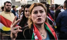  ??  ?? Kurds displaced from Kirkuk by the ongoing conflict between Iraq the Kurdistan region protest outside the US Embassy in Erbil. Photograph: Elizabeth Fitt/Rex