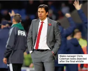  ??  ?? Wales nanager Chris Coleman looks dejected after the final whistle