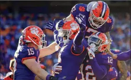  ?? GETTY IMAGES ?? Because it is in the Power Five conference most lacking in power, defending national champion Clemson has been relegated to No. 5 in the CFP poll. The Tigers, who haven’t lost since the 2018 Sugar Bowl, should win Saturday, but N.C. State will cover.