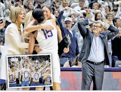  ?? AP (2) ?? HUSKIE HISTORY: Coach Geno Auriemma (right) looks up at the scoreboard with pride as his UConn team won its record 100th straight game on Monday, much to the joy of its fans (inset).