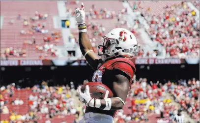  ?? Marcio Jose Sanchez ?? The Associated Press Stanford running back Bryce Love celebrates after scoring on a touchdown against Arizona State on Sept. 30 in Stanford, Calif.