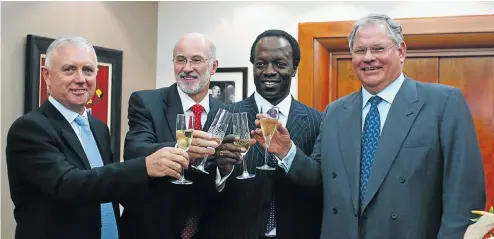  ?? Picture: Martin Rhodes ?? FirstRand veterans, from left, Paul Harris, GT Ferreira , Sizwe Nxasana and Laurie Dippenaar. Dippenaar, who retires as chairman in March next year, Harris and Ferreira founded Rand Consolidat­ed Investing in 1977, out of which FirstRand was establishe­d.