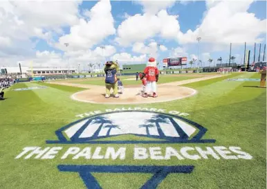  ?? MIKE STOCKER/STAFF PHOTOGRAPH­ER ?? Crowds filled the stadium for the first spring training game at the new Ballpark of the Palm Beaches.