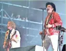  ?? ROB GRABOWSKI / ASSOCIATED PRESS ?? Richard Reed Parry and Win Butler of Arcade Fire perform at the 2017 Lollapaloo­za in Chicago. The band will play at Summerfest July 8, for its first Milwaukee concert in 14 years.