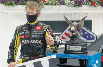  ?? MATT SLOCUM/ASSOCIATED PRESS ?? Brandon Jones celebrates after winning the NASCAR Truck Series auto race at Pocono Raceway on Sunday.