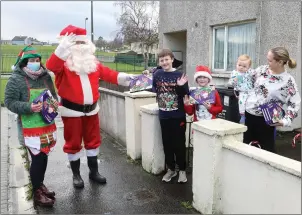  ??  ?? There was festive cheer in Cranmore with the visit of Santa Claus and his elves. Pics: Carl Brennan.