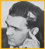  ??  ?? EXPLOSIVE: Maurice “Rocket” Richard, with his head bandaged from the fight, is told he is suspended for the season and the playoffs.