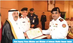  ??  ?? First Deputy Prime Minister and Minister of Defense Sheikh Nasser Sabah Al-Ahmad Al-Jaber Al-Sabah honors a graduate.