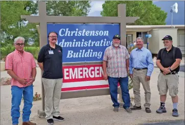  ?? Photo Submitted ?? Standing in front of the new sign at the recently renamed Christenso­n Administra­tive Building on the Southern Inyo Hospital Campus in Lone Pine are, left to right, Cody Christenso­n,
Dr. Christenso­n’s son, SIH CEO Peter Spiers, SIH Board Members Chuck Carson, Mark Lacey and Bruce Branson.