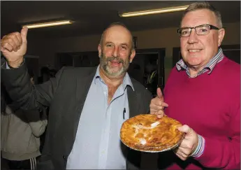  ??  ?? Political Pie: Danny Healy Rae, TD with Cllr Bobby O’Connell patroling their political territory at the Indoor Market at Castleisla­nd Community Centre on Friday night.