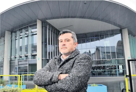  ??  ?? Gloom Nick Williams, chief exec at Horsecross Arts, stands before Perth Concert Hall, built to seat 1200