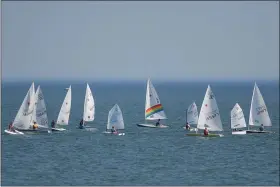  ?? MORNING JOURNAL FILE ?? A group of sailboater­s enjoy Lake Erie, just off of the Vermilion shoreline.