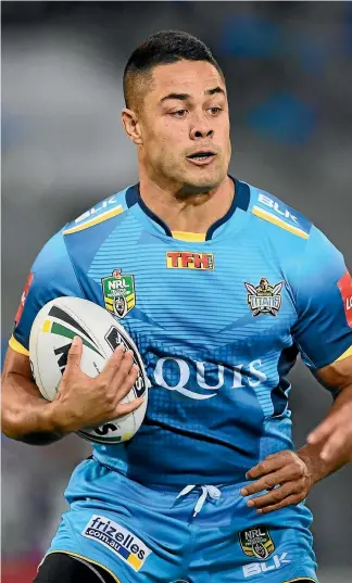  ?? PHOTO: GETTY IMAGES ?? Titans fullback Jarryd Hayne was well-contained by the Panthers defence.