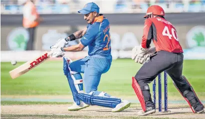  ?? Photo by Neeraj Murali ?? India’s Shikhar Dhawan on his way to 120 from 127 balls against Hong Kong in the Asia Cup match on Tuesday. —